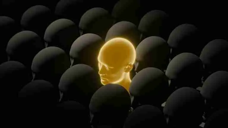 A glowing golden head stands out from a crowd of dark silhouettes around it.